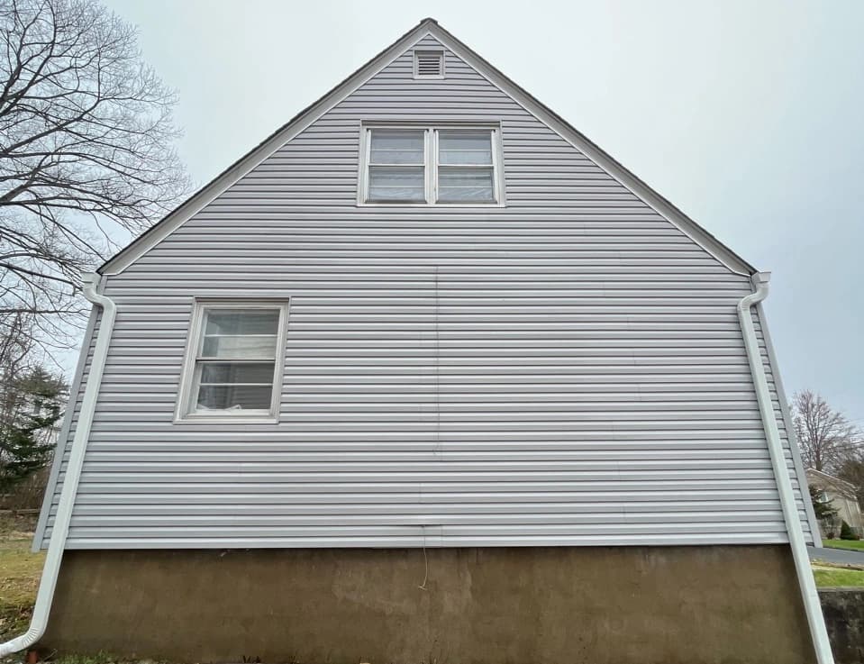 Euclid Power Washing technician performing detailed house washing in Euclid residential area