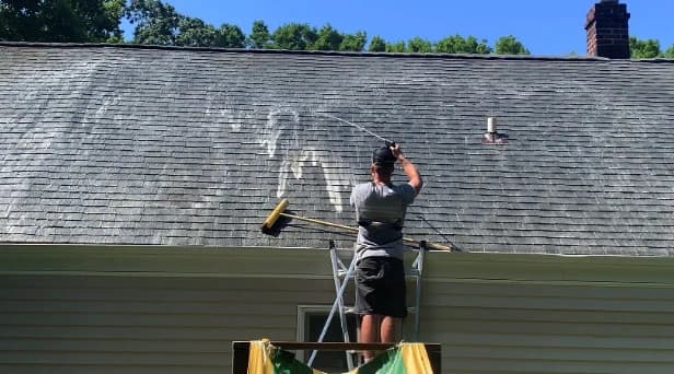 Before and after results of roof washing by Euclid Power Washing in Euclid