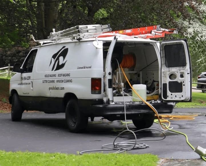 Euclid Power Washing professionals cleaning commercial fleet in Euclid